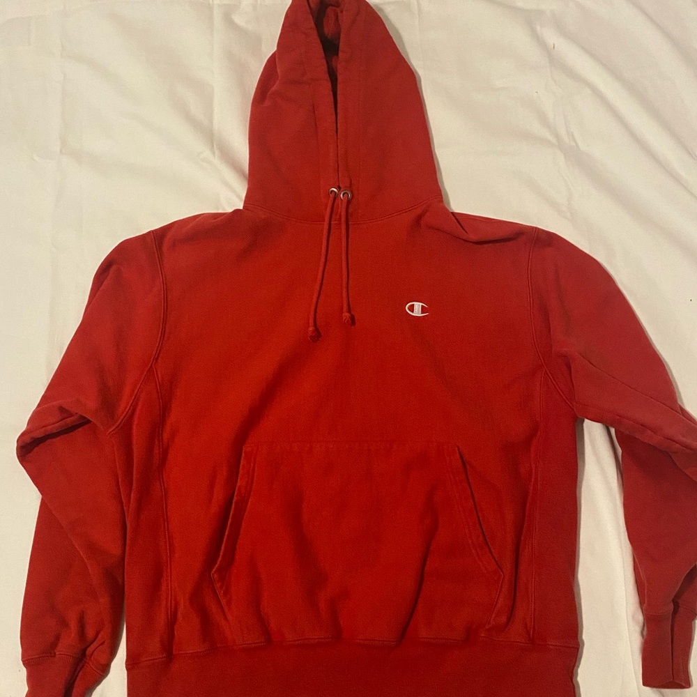 Red Champion hoodie for sale. Still in great condition and has hardly been used.